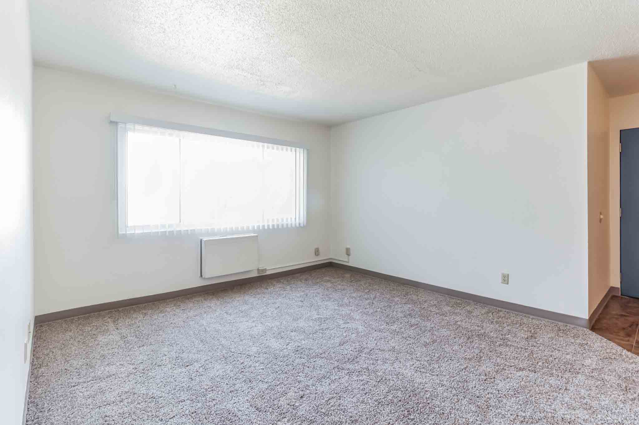Living Room at Hillcrest Living room at Hillcrest Apartments in Dubuque, IA with natural light and spacious layout — part of our affordable apartments.