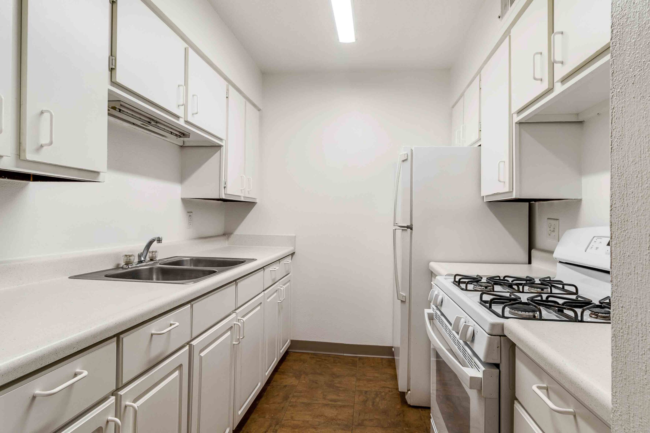 Kitchen at Hillcrest Kitchen at Hillcrest Apartments in Dubuque, IA with modern appliances and ample cabinet space — affordable apartments with comfort in mind.